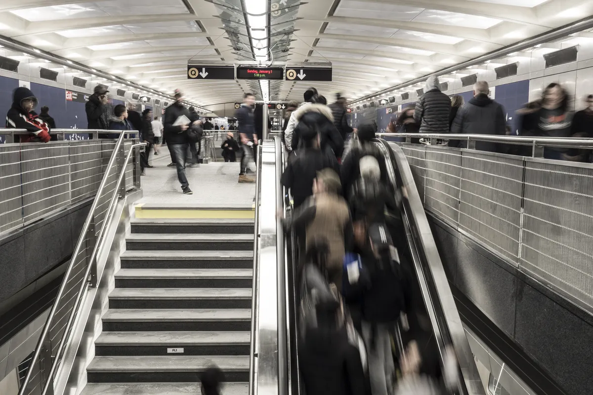 Stairs and escalator at the 96th Street Q station on Second Avenue on its opening day in 2017 (the nearby subway, not the building)