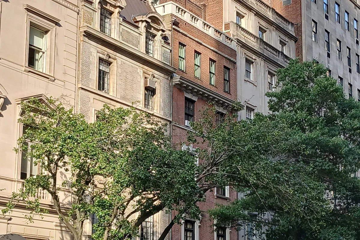 Limestone and brick townhouses on East 79th Street between Madison and Park Avenues (the neighborhood, not the building)