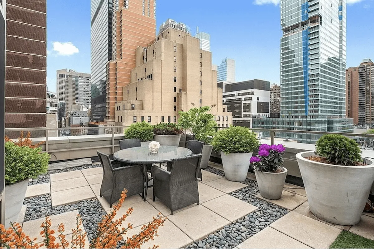 Wraparound terrace at The Milan condominium with Midtown Manhattan skyline view