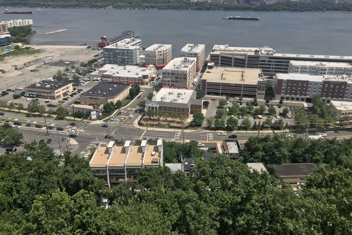 Edgewater Harbor from above, with Borough Hall, the Main Street retail buildings, and the waterfront residences along the Hudson